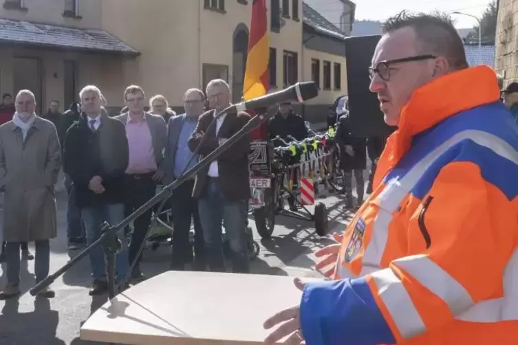 Staatssekretär Andy Bechtsprach Grußworte für das Land Rheinland-Pfalz. 