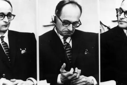 Der AngeklagteAdolf Eichmann in seinem Käfig aus Panzerglas während des Prozesses in Jerusalem.