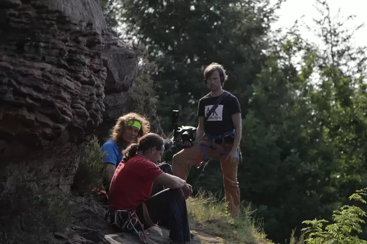 Besprechung vor dem Klettern: Burkard Maria Weber, Alexander Huber und Marco Küster (von links) am Einstieg der „Himmelsleiter“.