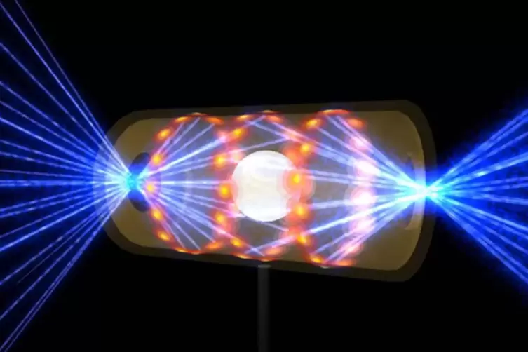 Diese Illustration zeigt das Experiment: Eine Hohlraumkapsel mit den Isotopen Tritium und Deuterium wird mit Laserstrahlen besch