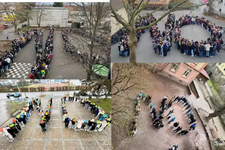 Die Schüler der Schulen formen das Wort „No“, also „Nein“. 