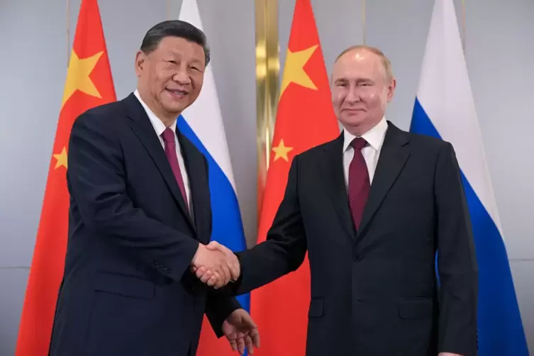 Wladimir Putin (r) und Xi Jinping,