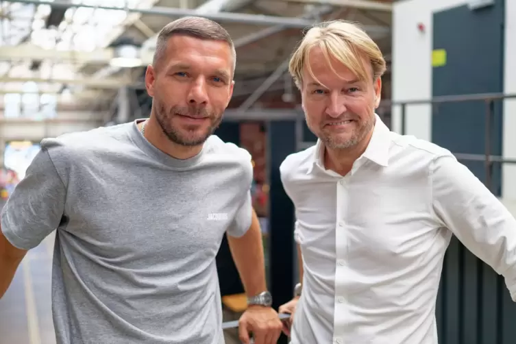 Interview mit Fußballprofi Podolski und Musikmanager Krampe