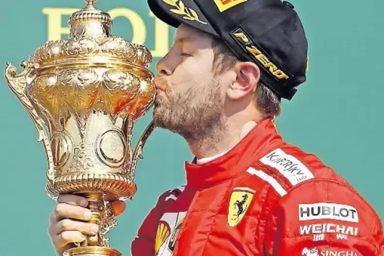 Siegerglück: Sebastian Vettel nach dem Coup in Silverstone.