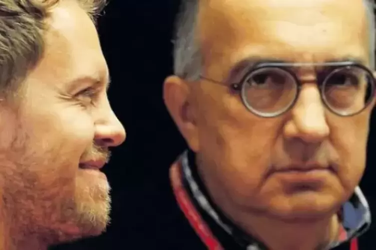 Den Rennstall Ferrari mit Pilot Sebastian Vettel (links) hat Marchionne wieder in die Spur gebracht.