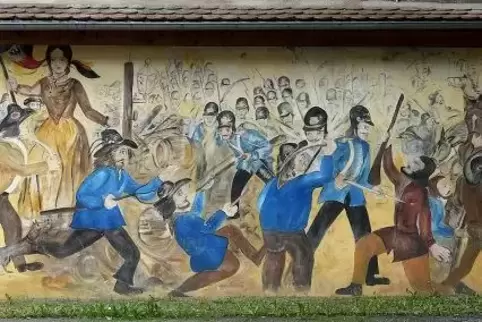 Ein farbenfrohes Wandbild erinnert an die blutrot gefärbten Ereignisse im Juni 1849.  Foto: Stepan